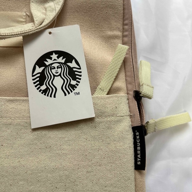 Starbucks(スターバックス)のスターバックス新品未使用タグ付きパソコンケース　ライトピンク　本物　非売品 スマホ/家電/カメラのPC/タブレット(その他)の商品写真