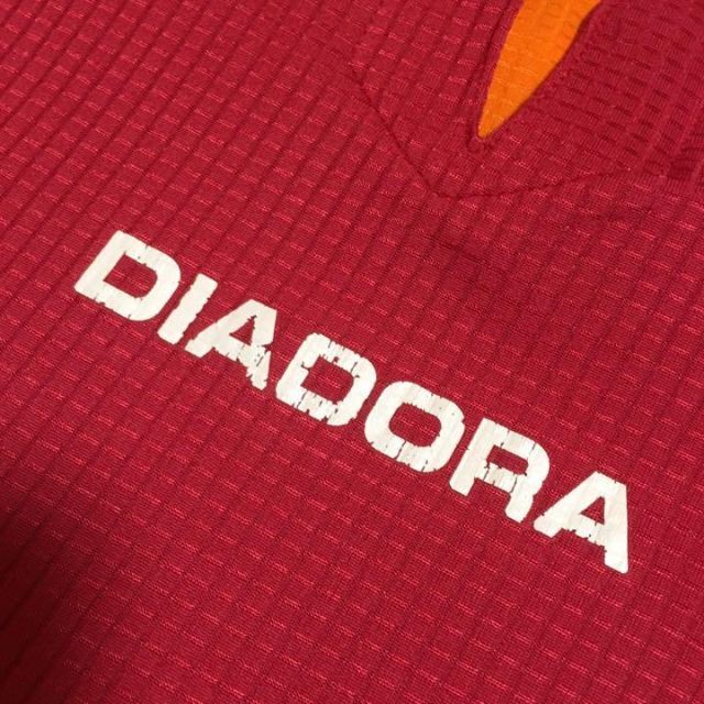 DIADORA(ディアドラ)の80～90s DIADORA ユニフォーム セットアップ 赤 オレンジ L～O スポーツ/アウトドアのサッカー/フットサル(ウェア)の商品写真