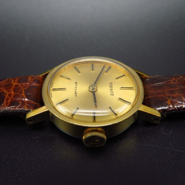 TISSOT - TISSOT STYLIST 手巻き腕時計 ゴールド文字盤 TISSOT - TISSOT STYLIST 手巻き腕時計 ゴールド文字盤