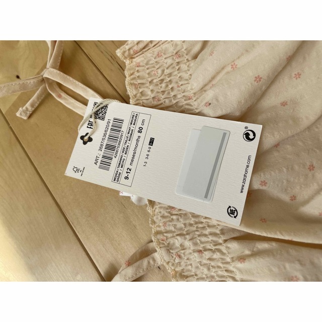 ZARA(ザラ)の新品タグ付き　ZARA HOME BABY フラワーロンパース　80 キッズ/ベビー/マタニティのベビー服(~85cm)(ロンパース)の商品写真