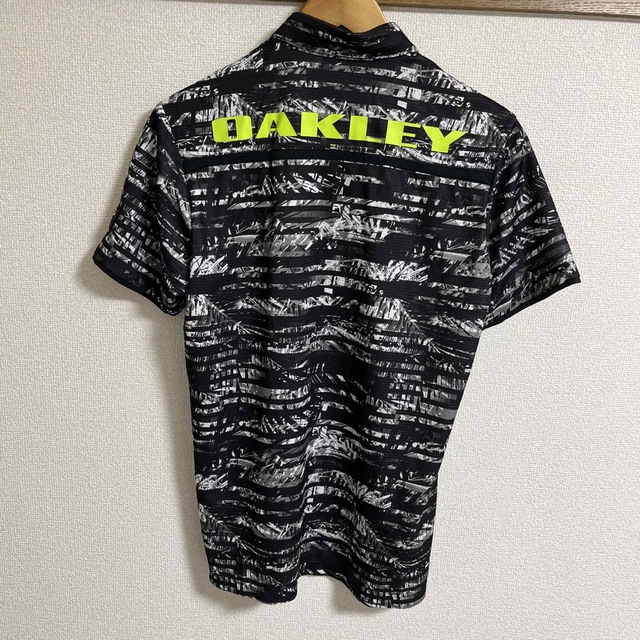 Oakley(オークリー)のオークリー　ゴルフポロシャツ メンズのトップス(ポロシャツ)の商品写真