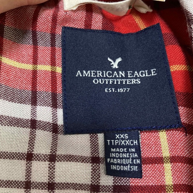 American Eagle(アメリカンイーグル)の【新品】AMERICAN EAGLE　アメリカンイーグル　チェックシャツ　赤 レディースのトップス(シャツ/ブラウス(長袖/七分))の商品写真