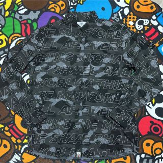 アベイシングエイプ(A BATHING APE)のAPE BAPE KAWS TEXT CAMO シャツ　tシャツ　ブラック　XL(シャツ)