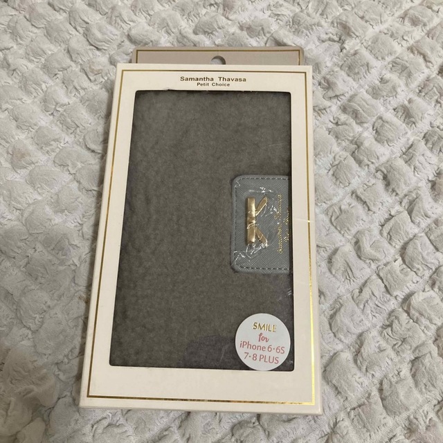 Samantha Thavasa Petit Choice(サマンサタバサプチチョイス)のサマンサタバサプチチョイス ボアリボンiPhoneケースグレー　新品　未使用 スマホ/家電/カメラのスマホアクセサリー(iPhoneケース)の商品写真