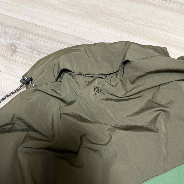 UNIQLO(ユニクロ)のユニクロ　JWA バイカラー　ポケッタブルパーカ　Sサイズ メンズのジャケット/アウター(ナイロンジャケット)の商品写真