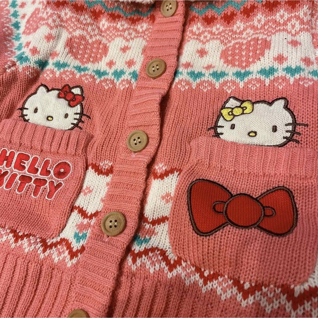 サンリオ(サンリオ)のハローキティ　前開きセーター　未使用品 キッズ/ベビー/マタニティのキッズ服女の子用(90cm~)(ジャケット/上着)の商品写真