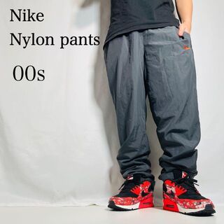 ナイキ(NIKE)の【Nike】00sナイキオレンジナイロンパンツ　古着ストリートXLサイズ(その他)