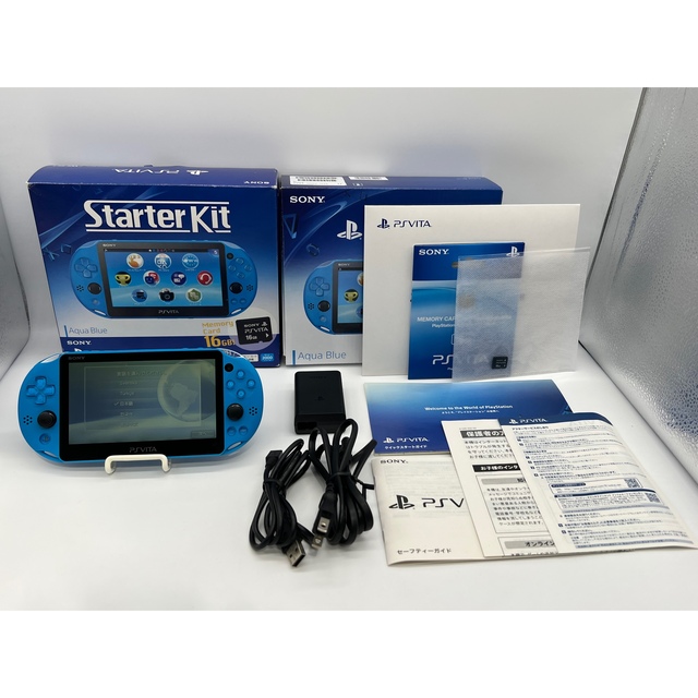 PlayStation Vita(プレイステーションヴィータ)の【完品・液晶美品】PS Vita Starter Kit アクア・ブルー 本体 エンタメ/ホビーのゲームソフト/ゲーム機本体(携帯用ゲーム機本体)の商品写真