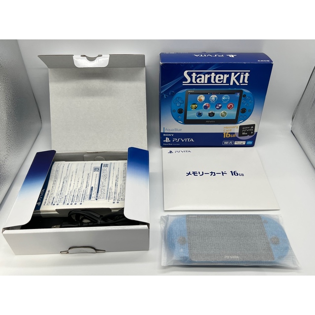 PlayStation Vita(プレイステーションヴィータ)の【完品・液晶美品】PS Vita Starter Kit アクア・ブルー 本体 エンタメ/ホビーのゲームソフト/ゲーム機本体(携帯用ゲーム機本体)の商品写真