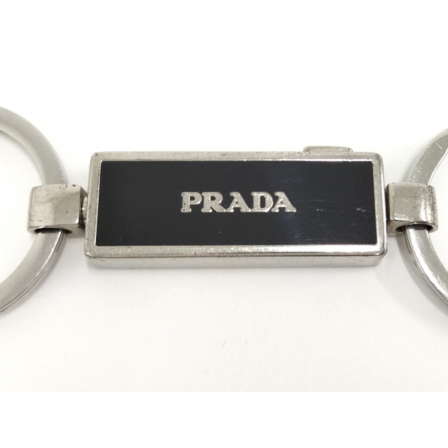 PRADA(プラダ)のPRADA キーリング キーホルダー ロゴ メッキ シルバー ブラック レディースのファッション小物(キーケース)の商品写真