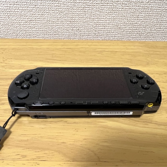 PlayStation Portable(プレイステーションポータブル)のPSP  グランツーリスモ　レーシングパック　【美品】おまけソフト3本 エンタメ/ホビーのゲームソフト/ゲーム機本体(携帯用ゲーム機本体)の商品写真