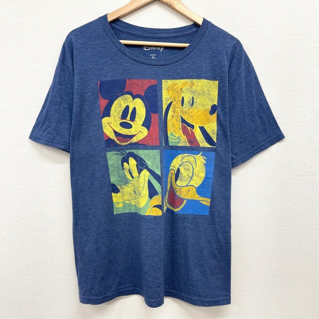 Disney(ディズニー)の【中古】 ゆうパケット対応 ディズニー DISNEY Tシャツ 半袖 キャラクター プリント サイズ：XL ネイビー 古着 中古 mellow メンズのトップス(Tシャツ/カットソー(半袖/袖なし))の商品写真