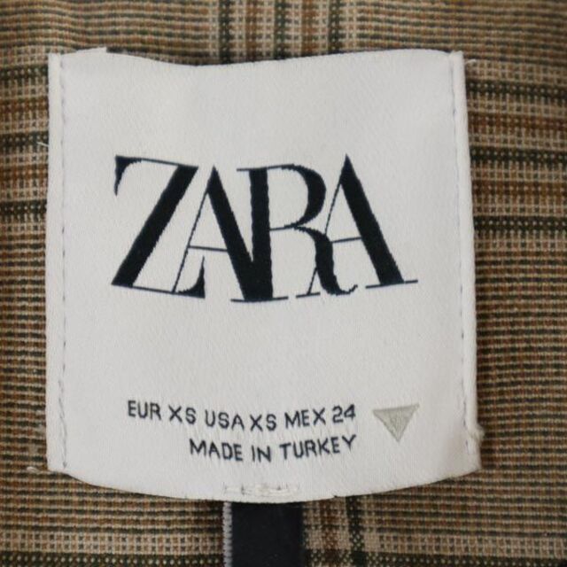 ZARA(ザラ)の未使用 ザラ ショート丈 チェック柄 テーラードジャケット XS ベージュ系 ZARA レディース 【中古】  【230319】 レディースのジャケット/アウター(ロングコート)の商品写真