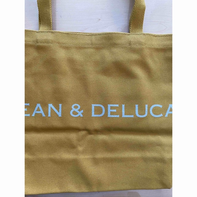 DEAN & DELUCA(ディーンアンドデルーカ)のDEAN & DELUCA チャリティートートバッグ イエロー 新品 レディースのバッグ(トートバッグ)の商品写真