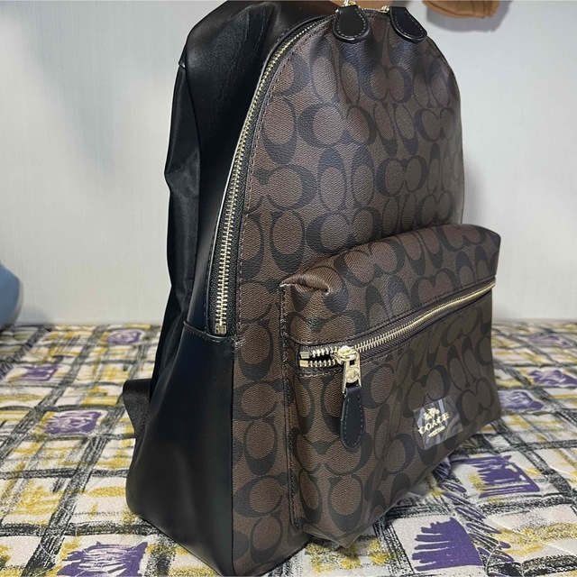 COACH(コーチ)の美品✨コーチ　リュック　シグネチャー　レザー　ブラウン×黒　PVC 大容量 レディースのバッグ(リュック/バックパック)の商品写真