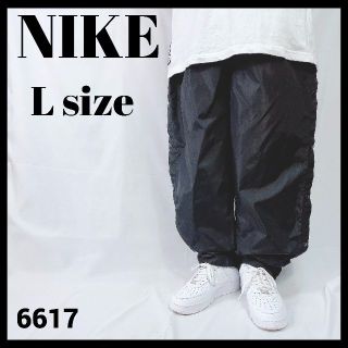 ナイキ(NIKE)の90s vintage 白タグ ナイキ スナップパンツ L 黒 ナイロンパンツ(その他)