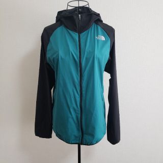 ザノースフェイス(THE NORTH FACE)のスワローテイル　ベント　フーディ　緑×黒(マウンテンパーカー)