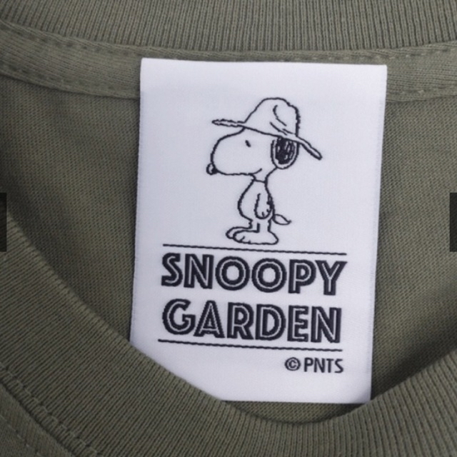 SNOOPY(スヌーピー)の【新品未開封】＜SNOOPY GARDEN＞ スヌーピー　Tシャツ　カーキ エンタメ/ホビーのおもちゃ/ぬいぐるみ(キャラクターグッズ)の商品写真