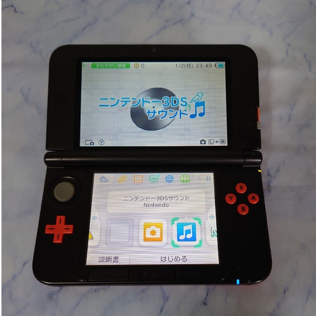 ニンテンドー3DS(ニンテンドー3DS)の「ニンテンドー3DS LL リミテッドパック オレンジ×ブラック」 エンタメ/ホビーのゲームソフト/ゲーム機本体(携帯用ゲーム機本体)の商品写真