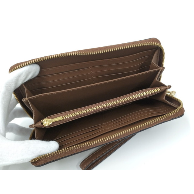 COACH ラウンドファスナー長財布 シグネチャー PVC ブラウン C4452