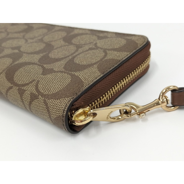 COACH ラウンドファスナー長財布 シグネチャー PVC ブラウン C4452