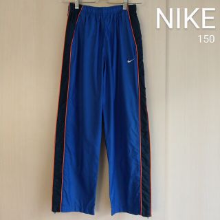 ナイキ(NIKE)のナイキ 裾 ファスナー ウィンドブレーカー パンツ ブルー M 140 150(パンツ/スパッツ)