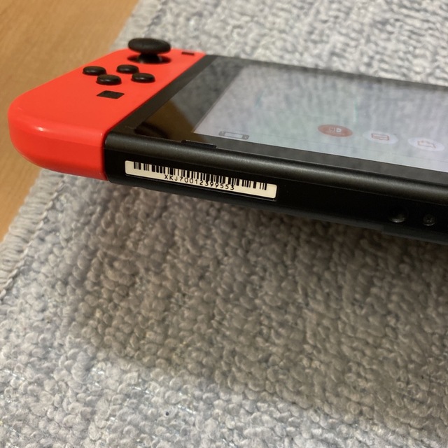 Nintendo Switch(ニンテンドースイッチ)のNintendo Switch本体　新型　動作品　中古 エンタメ/ホビーのゲームソフト/ゲーム機本体(携帯用ゲーム機本体)の商品写真