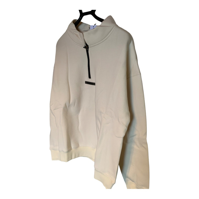 FEAR OF GOD(フィアオブゴッド)のESSENTIALS FOG ハーフジップアップスウェット クリーム色 Mサイズ メンズのトップス(スウェット)の商品写真