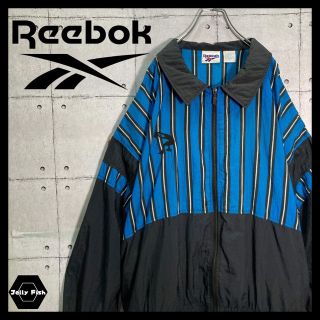 リーボック(Reebok)の【入手困難】Reebok/リーボック SHAQ シャック ナイロンジャケット 黒(ナイロンジャケット)