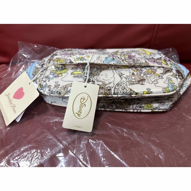 新品タグ付き!ジュエルナローズ ディズニー ふしぎの国のアリス バニティポーチ ポーチ ディズニー ふしぎの国のアリス ダイカットポーチチャーム