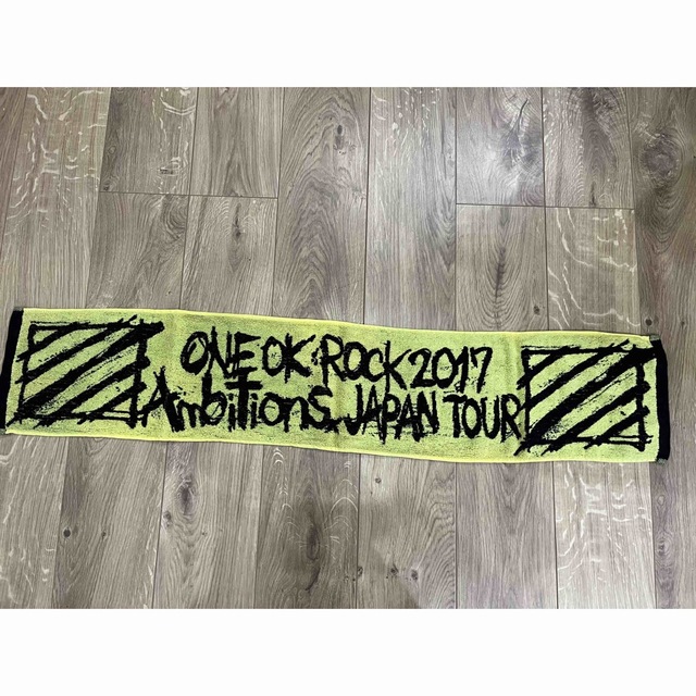 ONE OK ROCK(ワンオクロック)のONEOKROCK Ambitions タオル エンタメ/ホビーのタレントグッズ(ミュージシャン)の商品写真