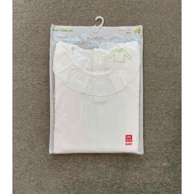 UNIQLO(ユニクロ)の新品 未使用  未開封★ユニクロ ★フリル クルーネックT  白 90cm キッズ/ベビー/マタニティのキッズ服女の子用(90cm~)(Tシャツ/カットソー)の商品写真