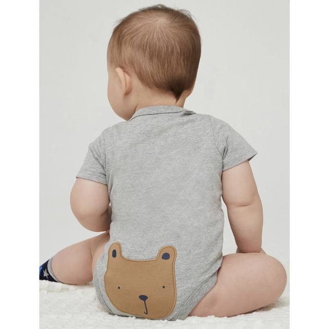 babyGAP(ベビーギャップ)のベビーギャップ　ブラナンベア　おしりクマ　グレー　ロンパース  80 キッズ/ベビー/マタニティのベビー服(~85cm)(ロンパース)の商品写真