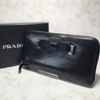 プラダ(PRADA)のプラダ PRADA 長財布 ラウンドジップ リボン ブラック 【65】(財布)