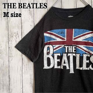 ビートルズ(THE BEATLES)のTHE BEATLESザビートルズ ビッグロゴ ダークグレー バンドtシャツ古着(Tシャツ/カットソー(半袖/袖なし))