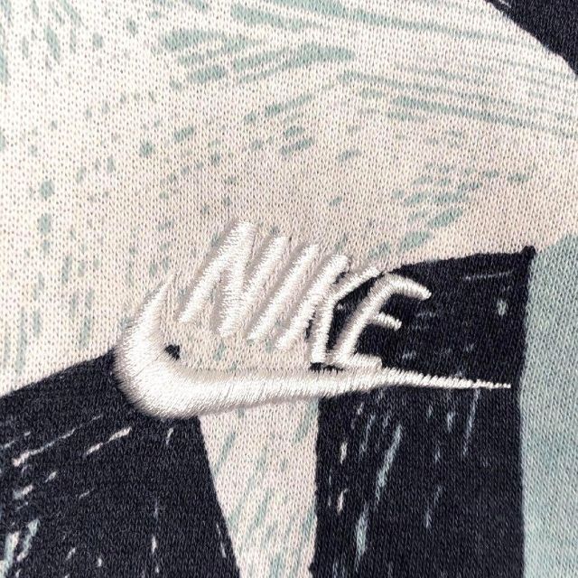 NIKE(ナイキ)のナイキ 総ロゴプリント スウェットパーカー 刺繍ワンポイントロゴ 総柄 裏起毛 メンズのトップス(パーカー)の商品写真