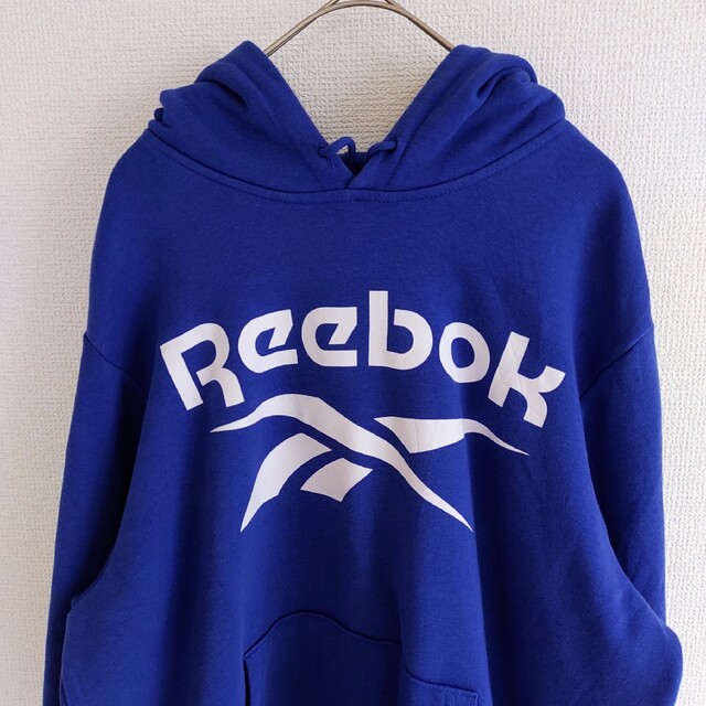 Reebok(リーボック)のReebok　リーボック　青　ロゴ　パーカー　メンズ　M サイズ　 レア メンズのトップス(パーカー)の商品写真