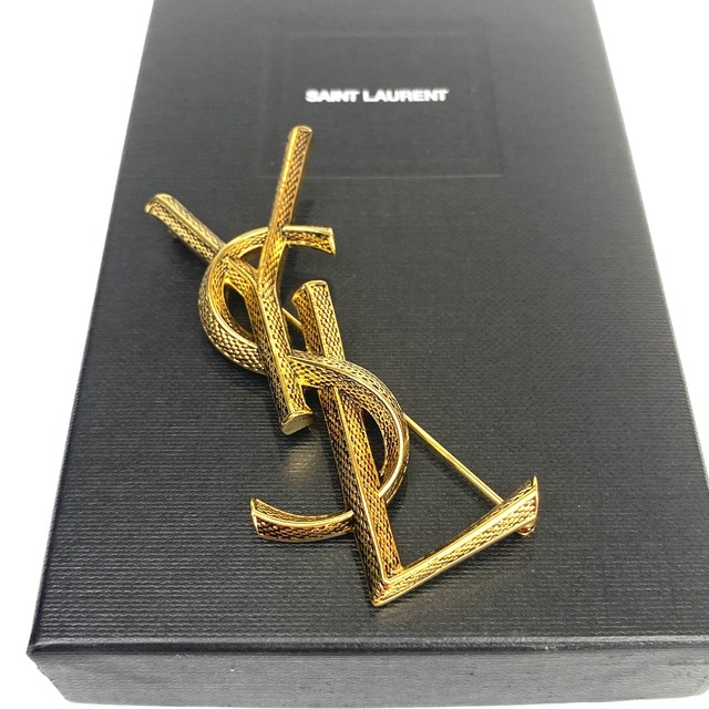 Saint Laurent(サンローラン)の[USED/中古]SAINT LAURENT サンローラン ブローチ ロゴ YSL ゴールド ブラック 中古 tdc-000683-4d レディースのアクセサリー(ブローチ/コサージュ)の商品写真