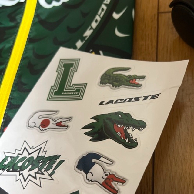 LACOSTE ラコステ ノベルティ ポーチ シール付きの通販 by Y's shop｜ラコステならラクマ