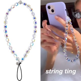 string ting ホワイト クリスタル スマホ ストラップの通販 by