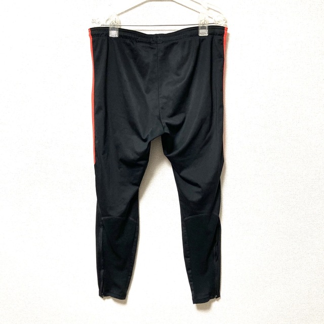 NIKE(ナイキ)の【美品】NIKE ナイキ　パンツ　ジャージ　サッカーウェア　細身　黒　赤　M メンズのパンツ(その他)の商品写真