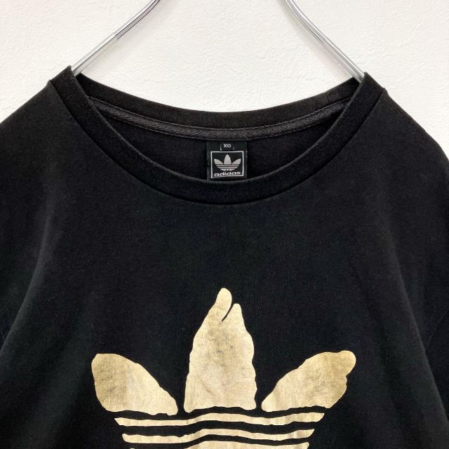 adidas(アディダス)の【大人気】アディダス オリジナルス ビッグロゴ 前プリント ゴールド Tシャツ レディースのトップス(Tシャツ(半袖/袖なし))の商品写真