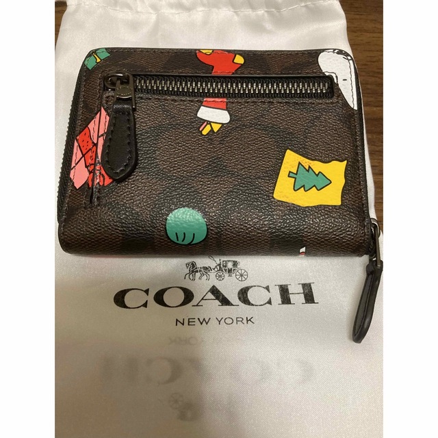 COACH(コーチ)のほぼ未使用コーチ　コラボ　二つ折り財布 レディースのファッション小物(財布)の商品写真