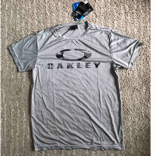 オークリー(Oakley)の新品　オークリー　Ｔシャツ グレー　L(Tシャツ/カットソー(半袖/袖なし))