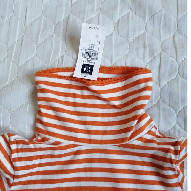 GAP(ギャップ)のGAP　タートルネック　オレンジ キッズ/ベビー/マタニティのキッズ服女の子用(90cm~)(Tシャツ/カットソー)の商品写真