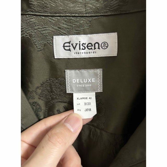 DELUXE(デラックス)のDELUXE x Evisen CAMELLIA SHIRTS XL カーキ メンズのトップス(Tシャツ/カットソー(七分/長袖))の商品写真