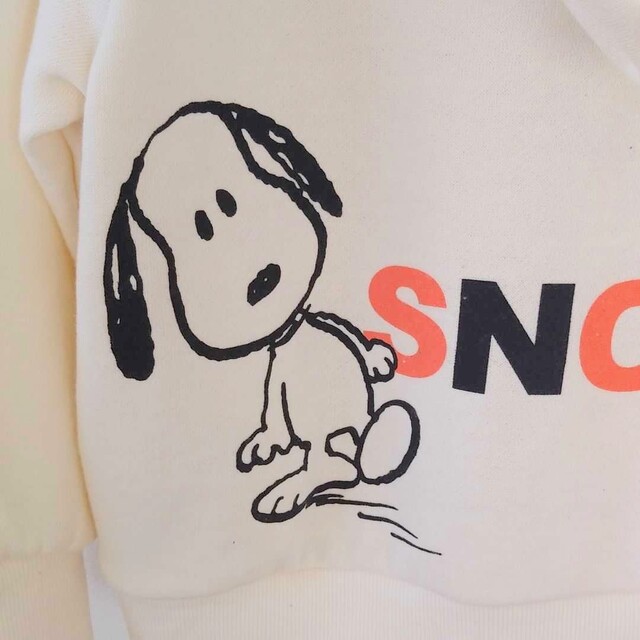 SNOOPY(スヌーピー)の【新品】スヌーピー　キッズ　長袖　パーカー　ユニバ　サイズ110　トレーナー キッズ/ベビー/マタニティのキッズ服女の子用(90cm~)(Tシャツ/カットソー)の商品写真