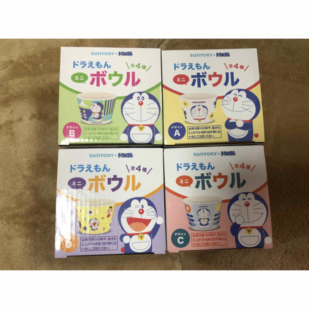 サントリー(サントリー)のドラえもん　ミニボウル&ペットボトルホルダー　 サントリー　合計8点 インテリア/住まい/日用品のキッチン/食器(食器)の商品写真