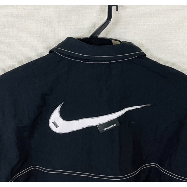 NIKE(ナイキ)のナイキ　NSW スウッシュ ウーブン ジャケット パンツ セットアップ　L レディースのジャケット/アウター(ナイロンジャケット)の商品写真