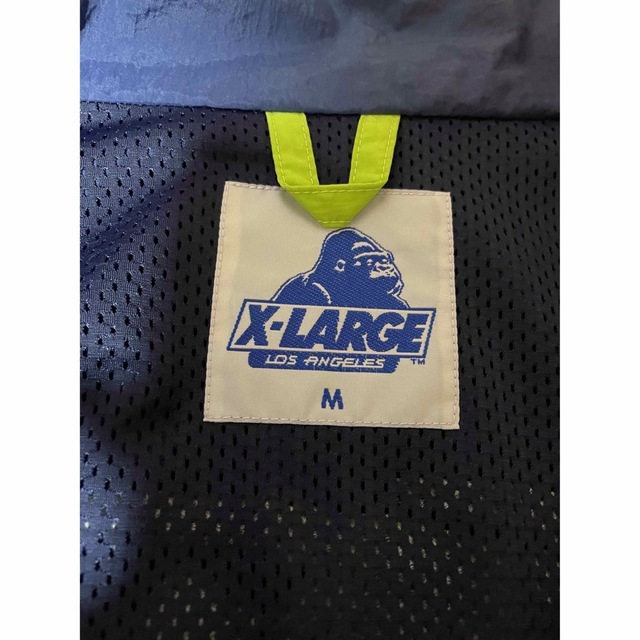 XLARGE(エクストララージ)のXLARGE×ストリートファイターII トラックジャケット　M メンズのジャケット/アウター(ナイロンジャケット)の商品写真